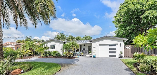 view of front of home with a garage