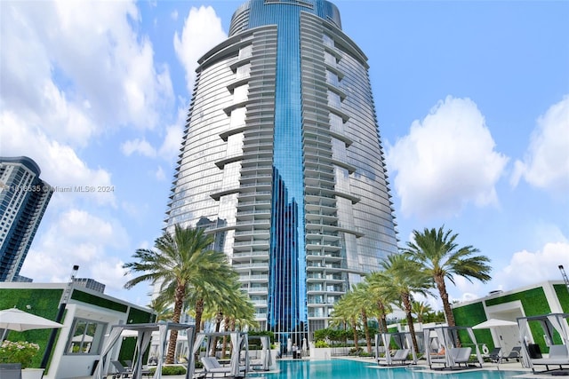 view of property featuring a community pool