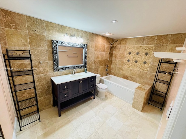 full bathroom with vanity, tile walls, and tile patterned floors