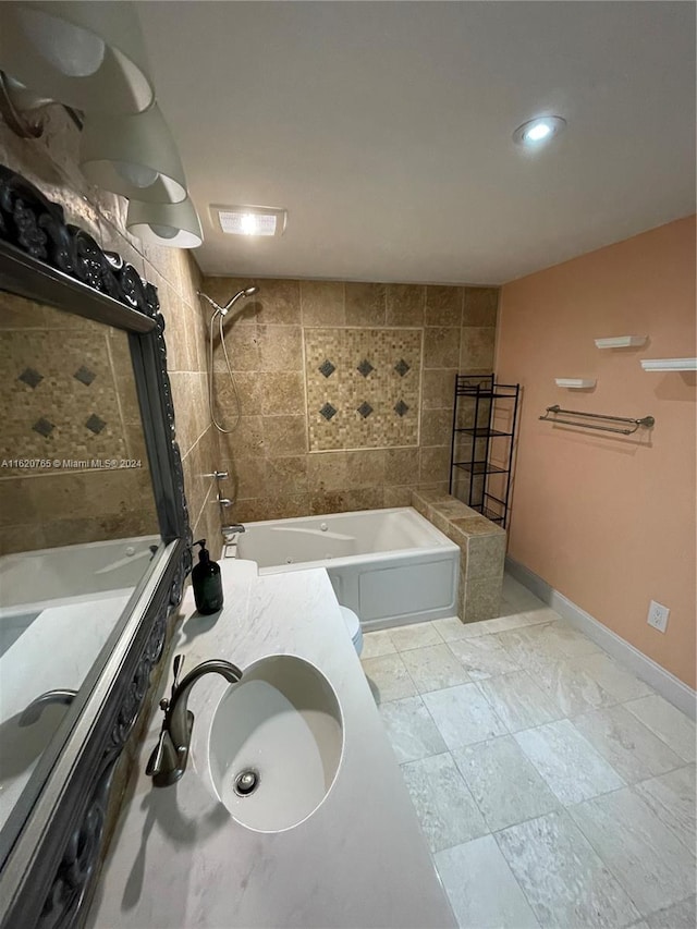 bathroom with tile patterned floors and vanity