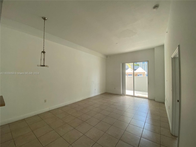 view of tiled spare room