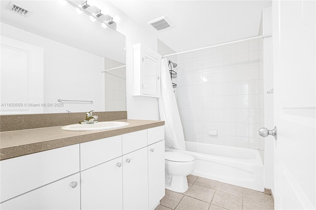 bathroom featuring toilet, shower / bath combo, visible vents, and tile patterned floors