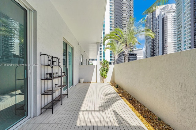 exterior space with a balcony and a city view