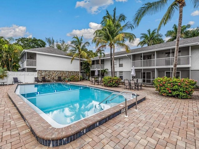 view of pool featuring a patio area