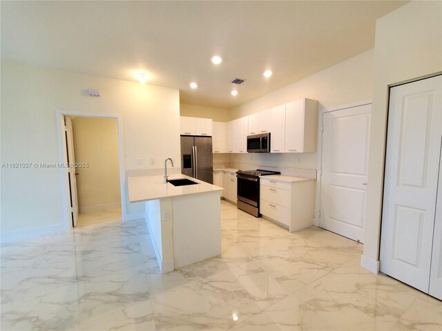 4278 NW 82nd Ave Unit 4278, Doral, FL 33166 - kitchen featuring stainless steel appliances, a sink, white cabinetry, baseboards, and light countertops