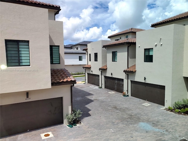 view of patio / terrace featuring a garage