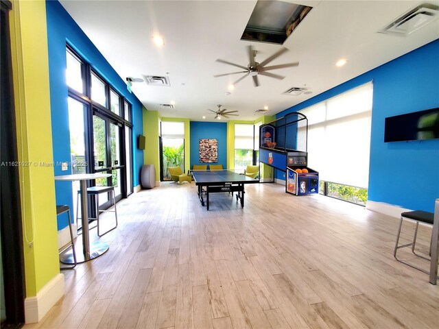 recreation room featuring light hardwood / wood-style flooring