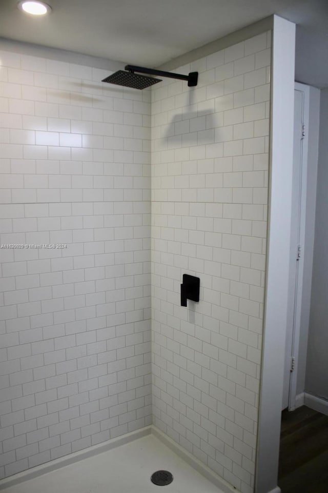 bathroom featuring a shower stall