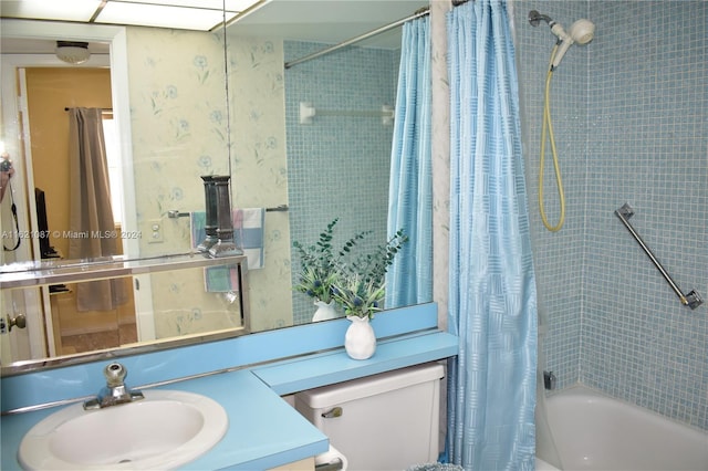 bathroom featuring vanity and shower / tub combo