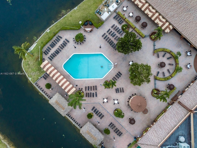 bird's eye view with a water view