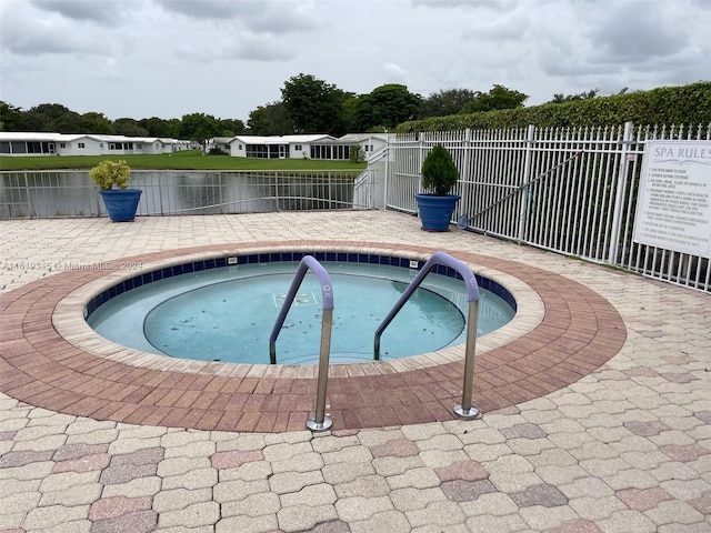 view of swimming pool featuring a patio area