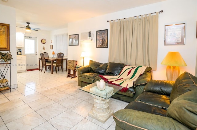 sitting room with light tile patterned floors and ceiling fan