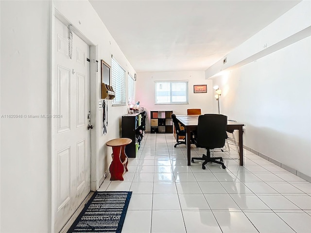 office space featuring light tile patterned flooring