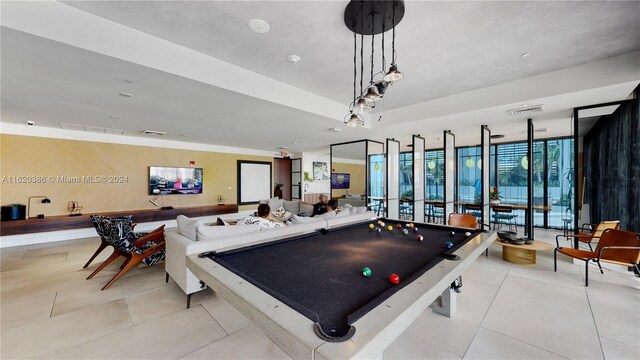 playroom with pool table and light tile patterned flooring