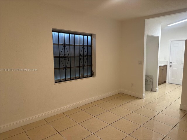 view of tiled spare room