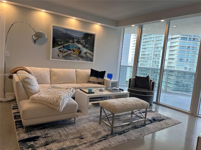 living room with floor to ceiling windows