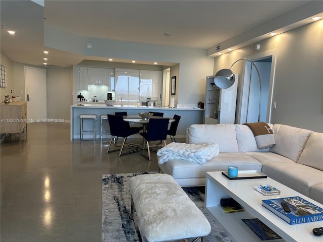 living room featuring recessed lighting