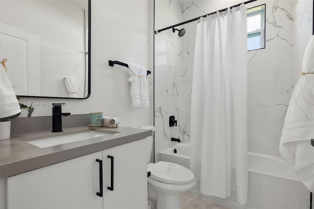 full bathroom featuring shower / bath combo, vanity, and toilet