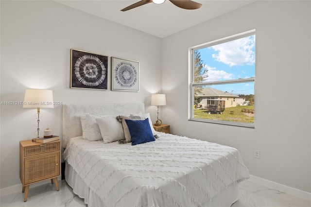 bedroom featuring ceiling fan