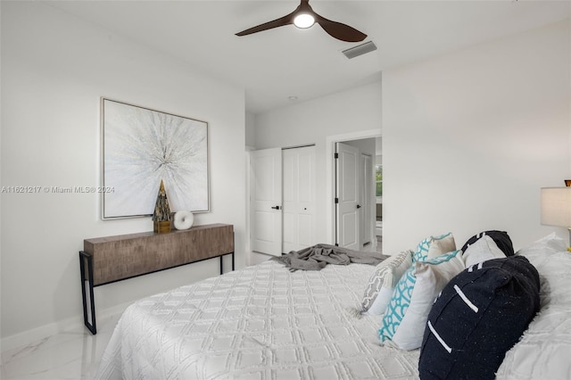 bedroom with a closet and ceiling fan