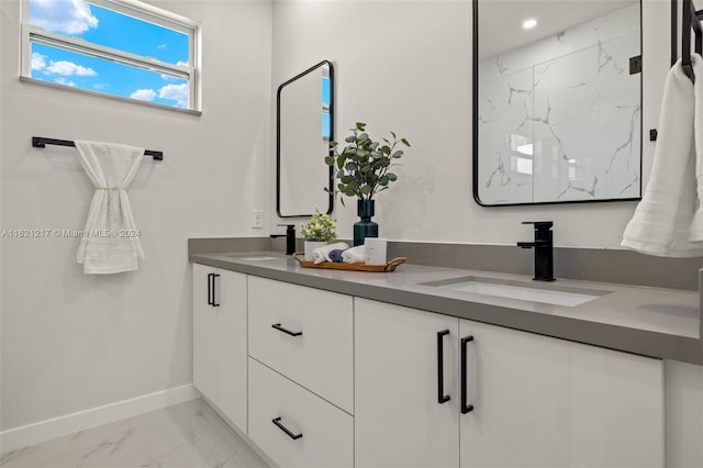 bathroom with a shower and vanity