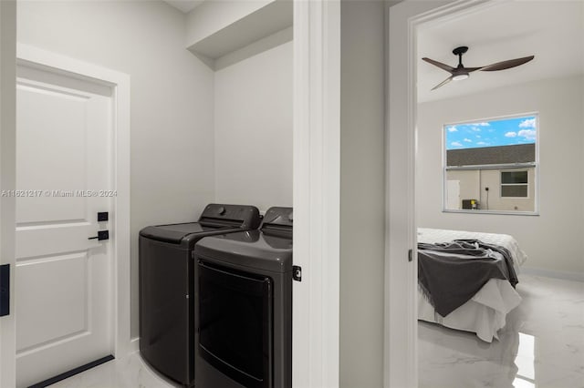 laundry area featuring washing machine and dryer and ceiling fan