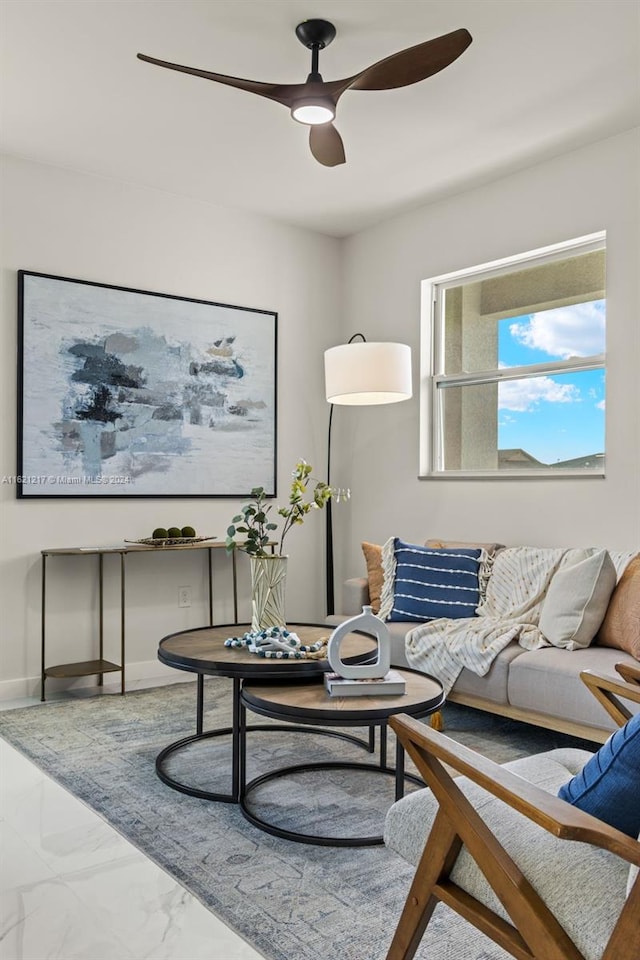 living room featuring ceiling fan