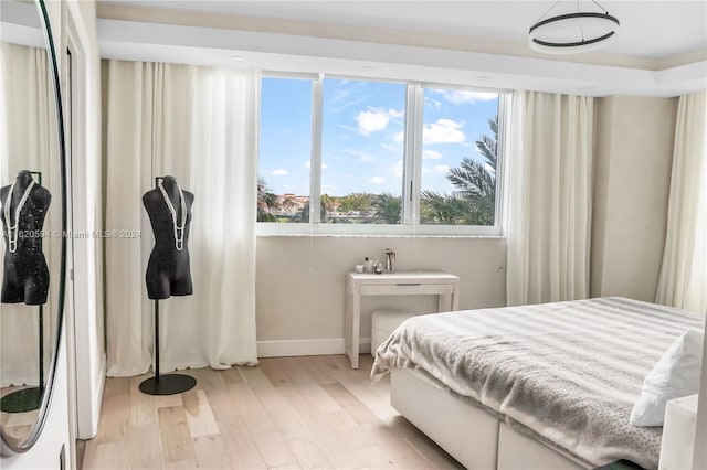 bedroom with light wood-type flooring