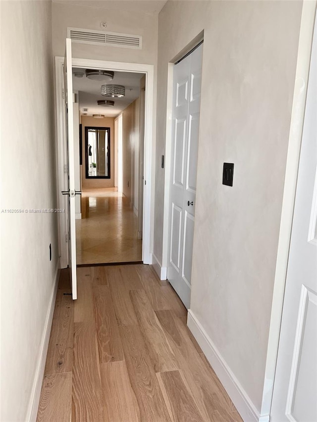 1745 E Hallandale Beach Blvd Unit 303W, Hallandale Beach, FL 33009 - hall featuring light wood-style floors and baseboards