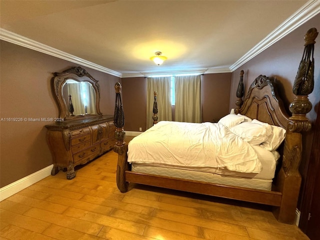 bedroom with hardwood / wood-style floors and ornamental molding