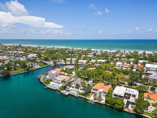 bird's eye view with a residential view and a water view