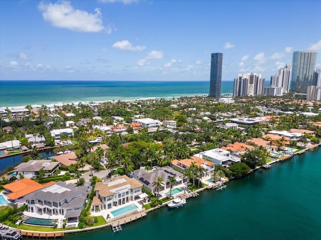 drone / aerial view with a water view and a city view