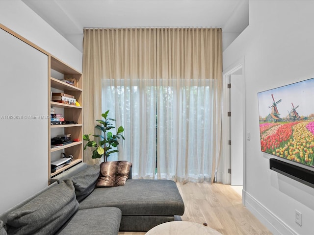 living area with light wood-style flooring