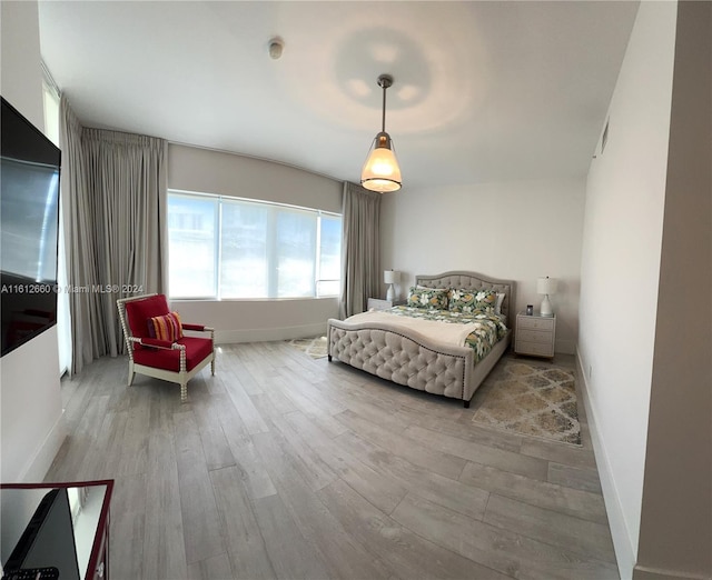 bedroom featuring light wood-type flooring