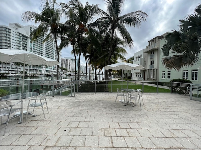 view of patio featuring a water view