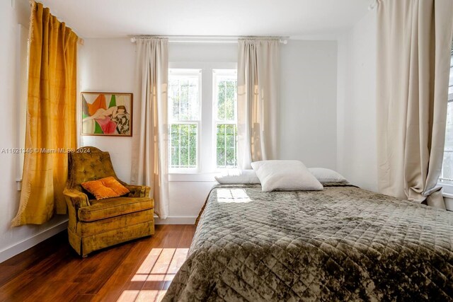 bedroom featuring hardwood / wood-style flooring