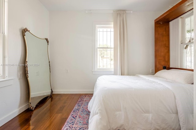 bedroom featuring dark hardwood / wood-style floors