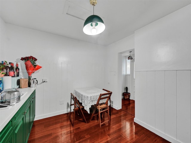 dining space featuring dark wood-type flooring