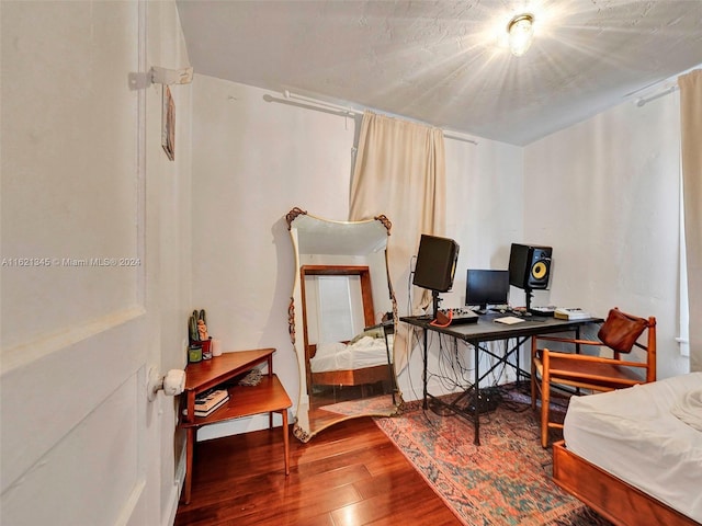 home office featuring hardwood / wood-style floors