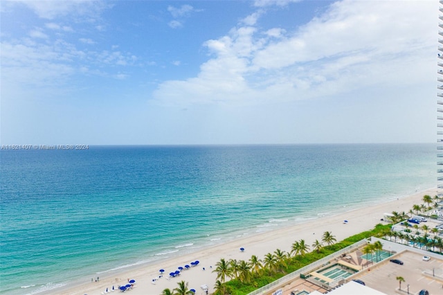 view of water feature with a beach view