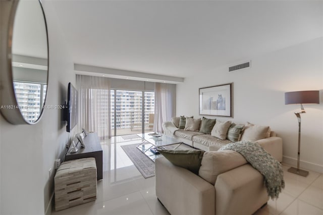 living room with light tile patterned floors