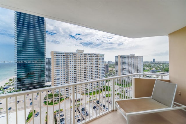 balcony featuring a water view