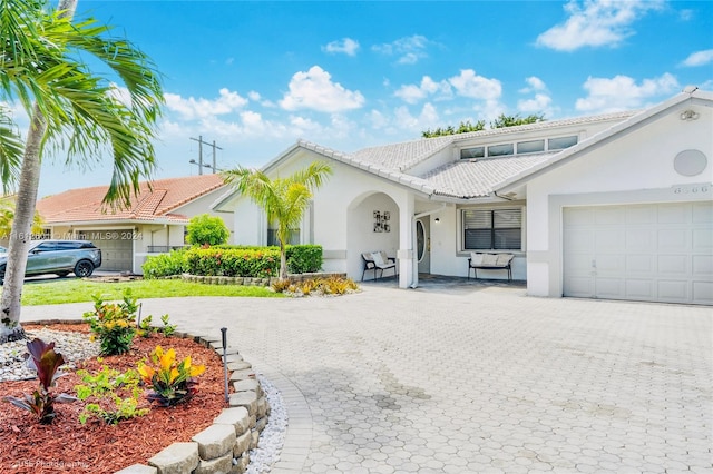 view of front of home with a garage