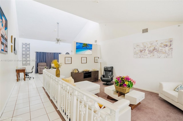 tiled living room featuring lofted ceiling