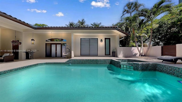 view of swimming pool featuring a patio