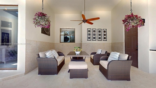 living room featuring ceiling fan