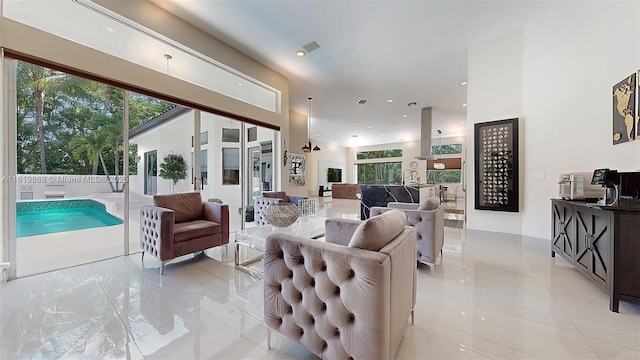 tiled living room with a wealth of natural light