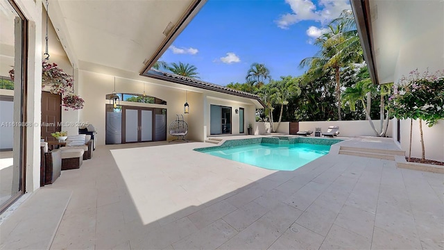 view of pool with a patio area