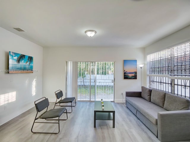 living room with light hardwood / wood-style floors