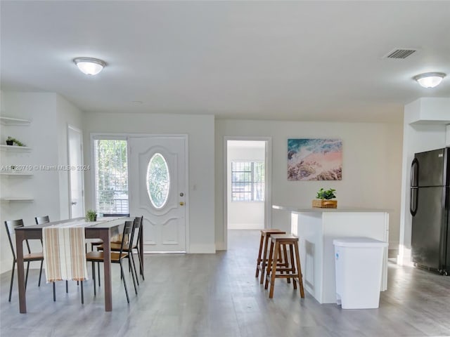 dining room with light hardwood / wood-style floors